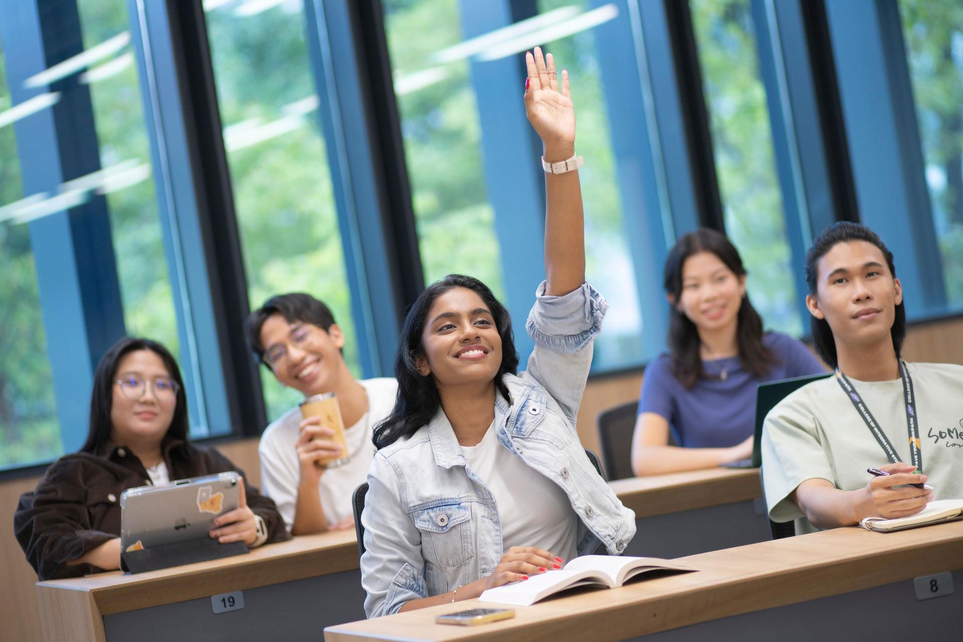Student raised hand in class